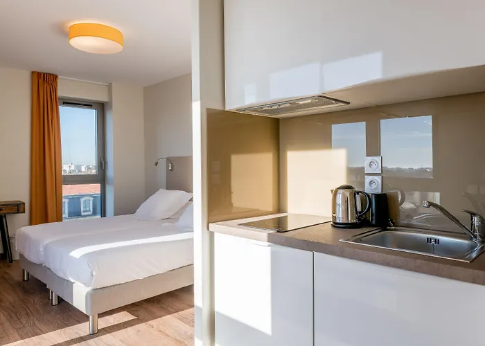 Apartahotel - Centre Gare